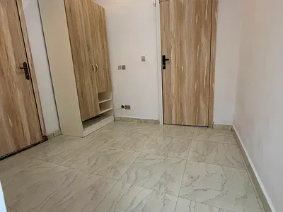 Downstairs Bedroom Inside a Shared Duplex
