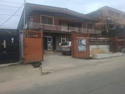 Block of 3bedroom Flats with a 2room BQ and 3 Standard Shops