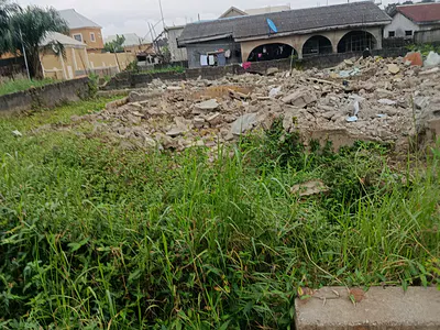 Dry Half Plot of Land Fenced Round on a Corner Piece — Bucknor, Oke Afa, Isolo, Lagos