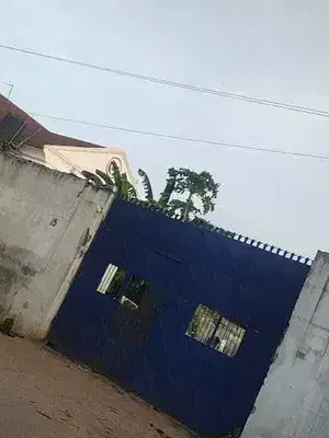 A Fenced and Gated Parcel of Land Measuring 1, 300 SQM — Ilupeju, Lagos