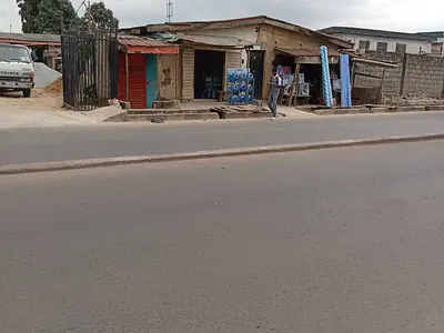 Commercial Half Plot of Land with to Be Demolished House on 35 by 80FT — Directly on Jonathan Coker Road, Fagba, Agege, Lagos