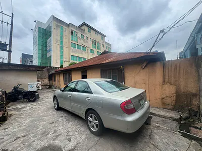 Land Measuring 450SQM with a Demolishable Bungalow — Ikeja, Lagos