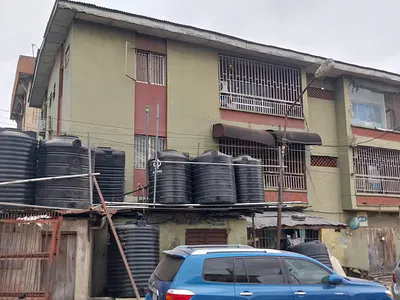 A Corner Piece 2 Storey Building That Can Be Demolished or Remodelled — Ikeja, Lagos
