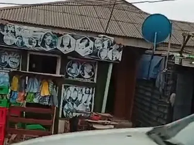 A Plot of Land Measuring 100 by 100SQM with Structure — Oyetayo St. Close to Arena Market Traffic Light, Oshodi, Lagos