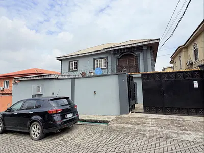Fairly Used 4 Units of 2 Bedroom Apartment in a Call to Access Estate — Magodo, Lagos