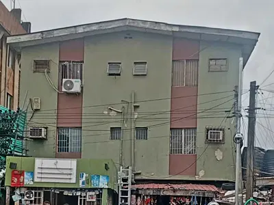 A Corner Piece 2 Storeys Building on a Plot of Land — Ikeja, Lagos