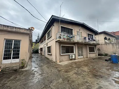Residential Land with 4 Flats and Bungalow — Ilupeju, Lagos