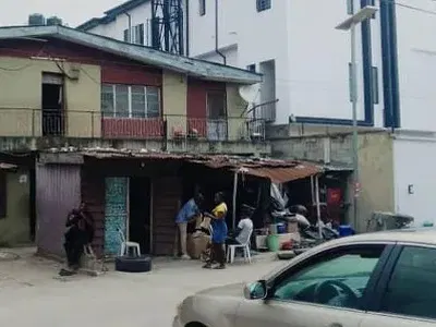 A Full Plot of Land with Demolishable Structures — Opebi, Ikeja, Lagos