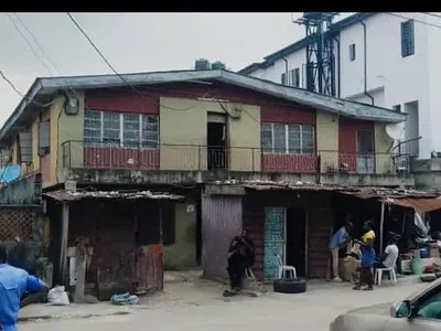 A Full Plot of Land with Demolish-Ables — Opebi, Ikeja, Lagos