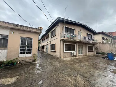 Land Measuring 630SQM with 4units of 2bedroom Flats and a 2bedroom Bun — Secured Environment at Ilupeju Estate, Ilupeju, Lagos