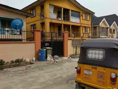 Land Measuring 600SQM with Storey Building — Obanikoro, Shomolu, Lagos