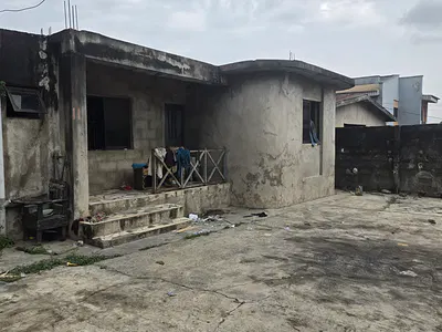 A Decked 4 Bedroom Flat with Mini Flat Facing Major Road — Lowa Estate Area by Haruna Bus Stop, Ikorodu, Lagos