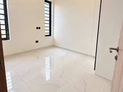 Medium Sized Upstairs Bedroom Inside a Shared Apartment. — Ajah, Lagos