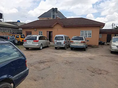 A Commercial Bungalow Directly Along the Expressway — By Cement Bustop Dopemu, Alimosho, Lagos