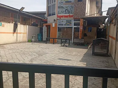 A Story Building Alone in the Compound Along a Major Road — Along Akowonjo Road Micom Bus Stop, Egbeda, Alimosho, Lagos