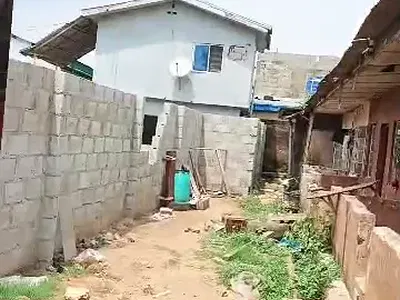 A Half Plot of Land — Opeki Road, Ipaja, Lagos