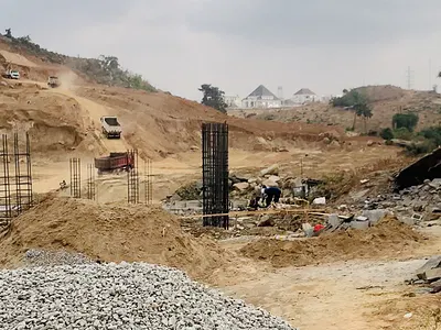 Mini Estate Land by the Roadside — Guzape District, Abuja