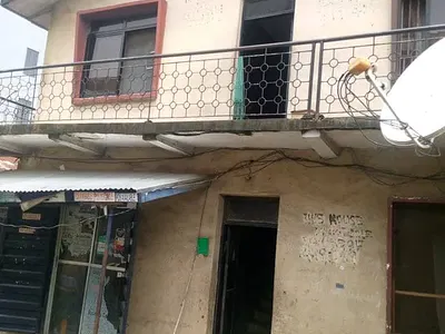 Storey Building with Rooms and Flats — Ikeja, Lagos