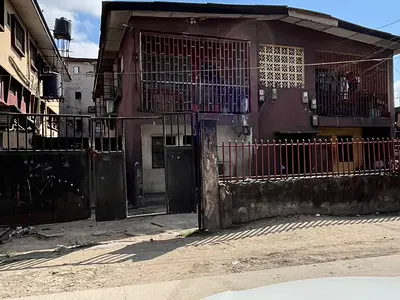 Solid Block of 4 Flats in a Serene and Secured Close. — Off Western Avenue, Surulere, Lagos