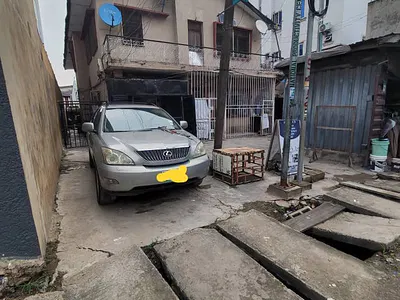 A Storey Building Sitting on 511SQM — Abule Oja, Yaba, Lagos