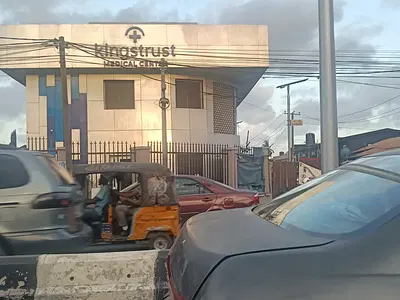Corner Piece Detached Duplex with Flats at the Back — Ogunlana Drive, Surulere, Lagos
