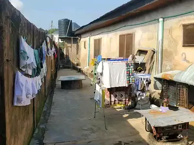 Residential Land with Two Demolishable Bungalows — Iwaya, Yaba, Lagos