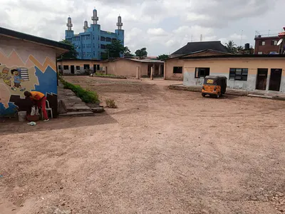 Corner Piece Commercial Land with Demolishable School Structure — Oshodi-Apapa Expressway, Boladele and Church Street, Oshodi, Lagos