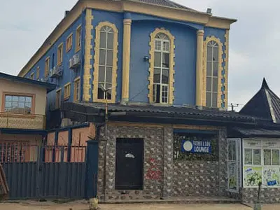 27 Room Furnished Hotel on a Corner Piece